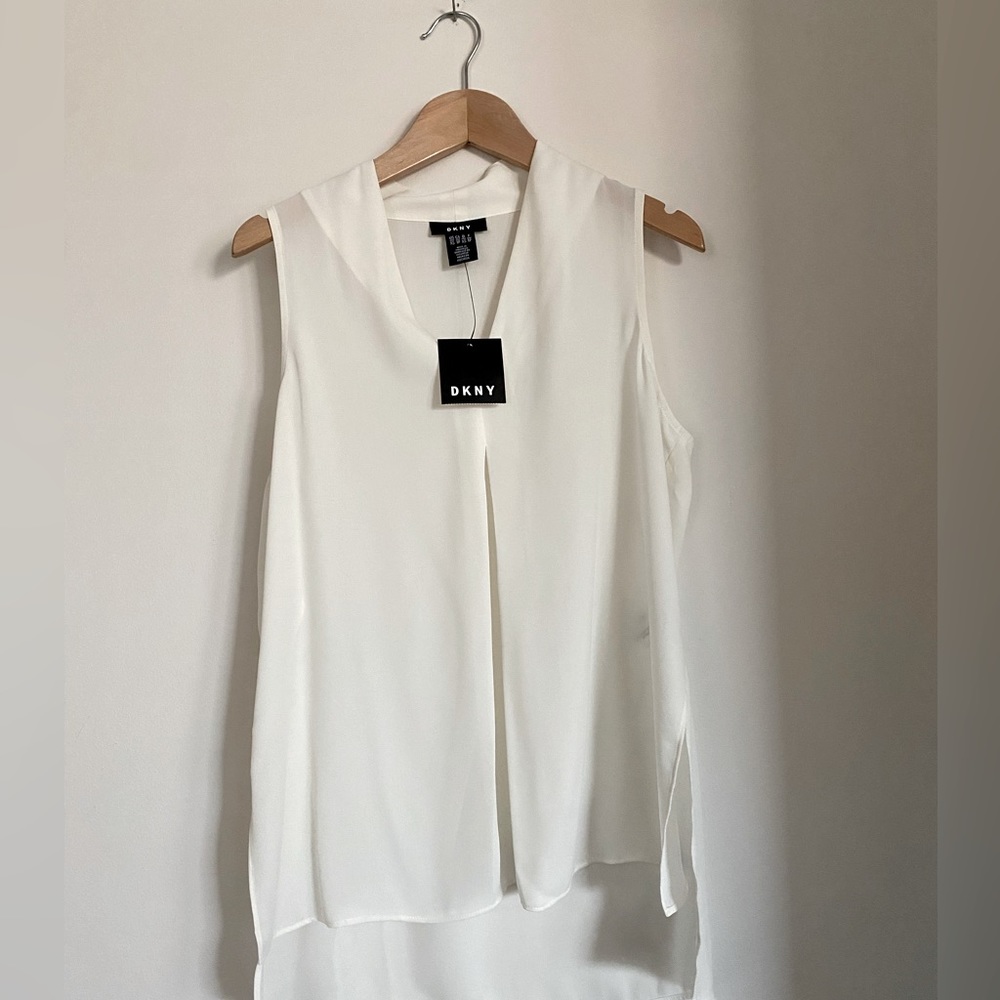NEW Donna Karan beautiful and delicate blouse. Off white. A must in a closet.